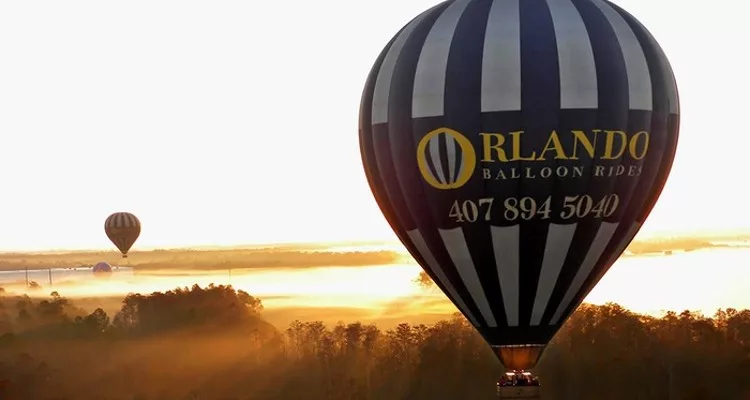 3 hot air baloons during sunrise in Central Florida